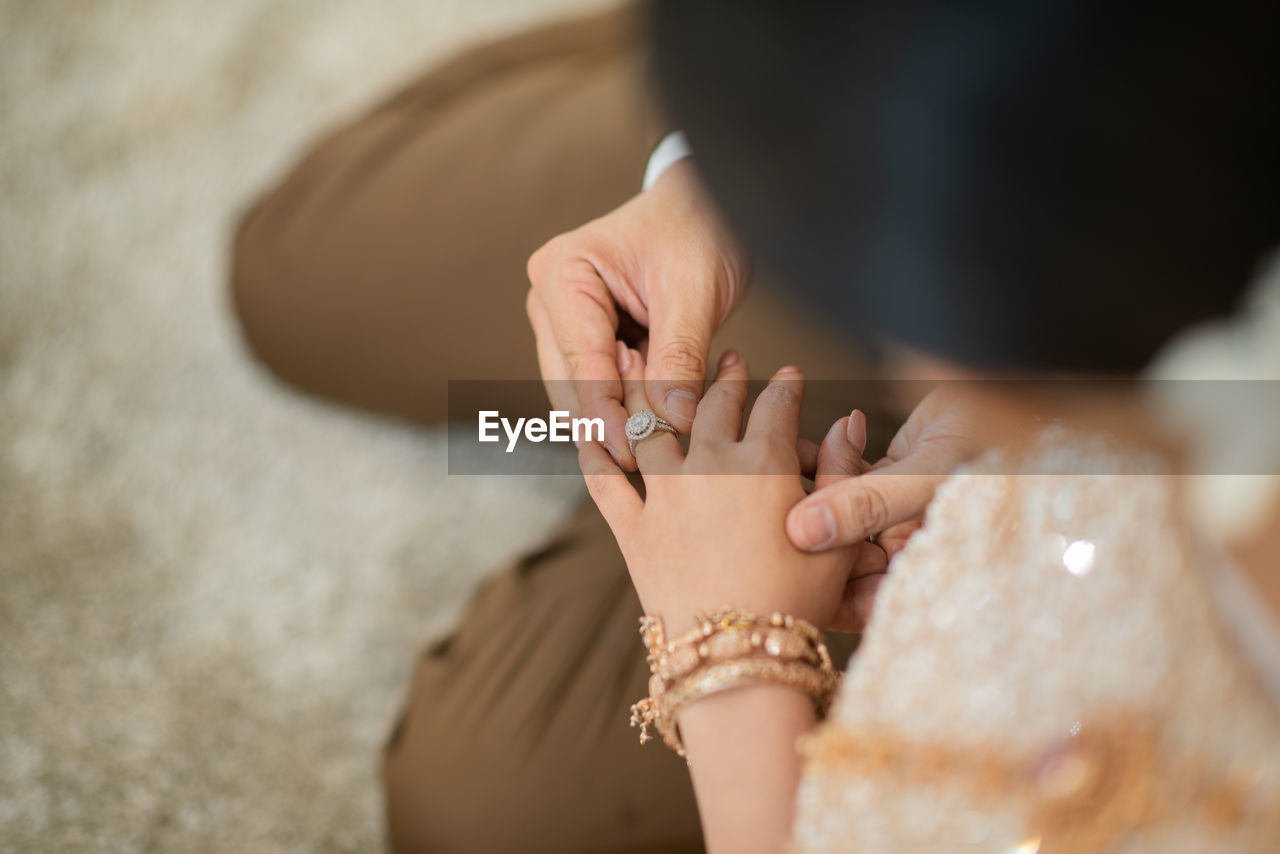 cropped image of woman with hands