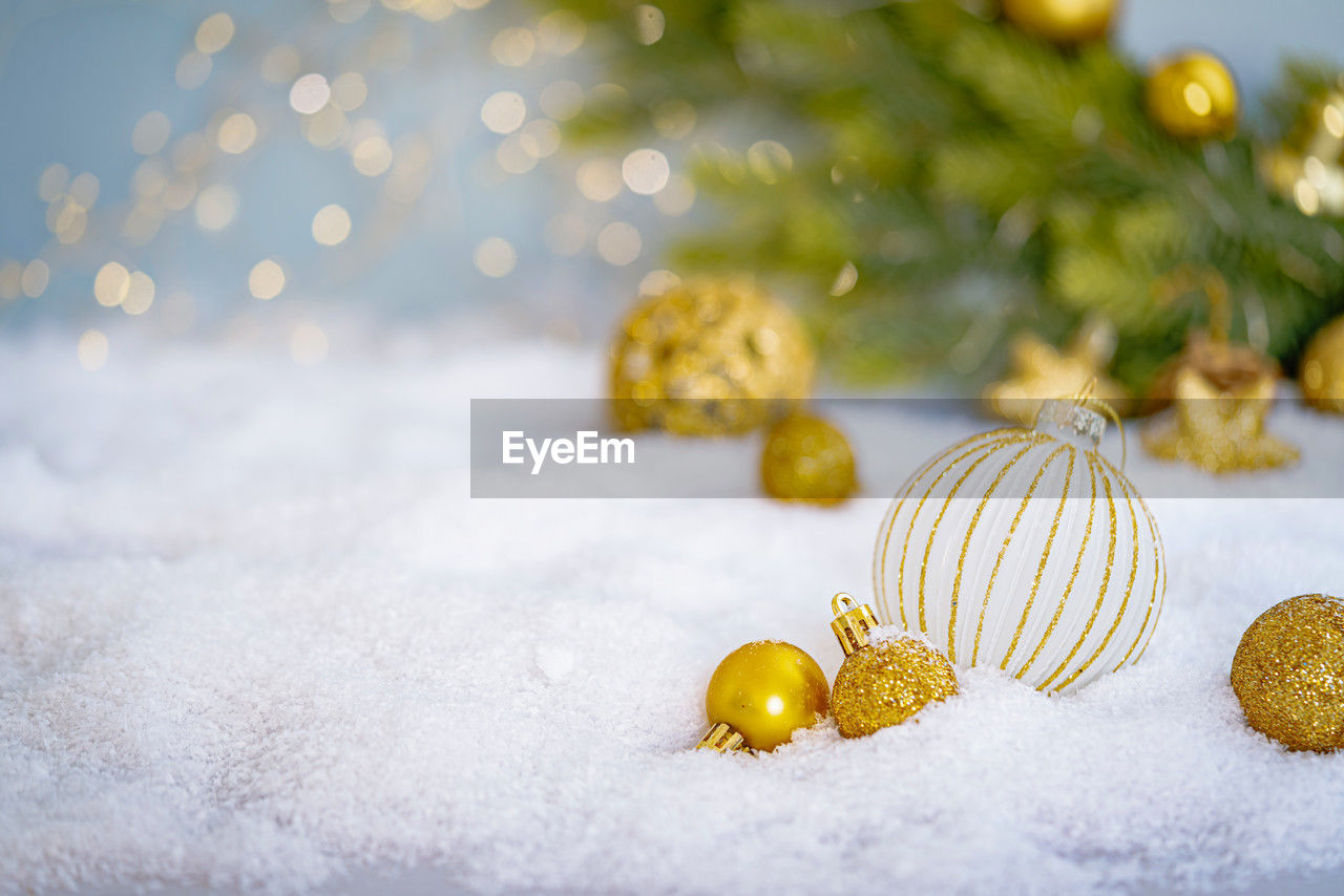 close-up of christmas decoration on snow