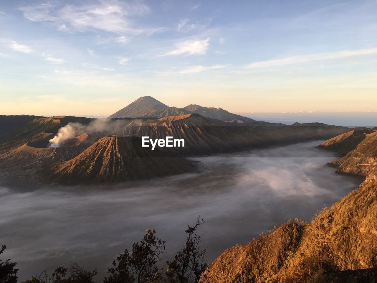 View of volcanic landscape against sky
