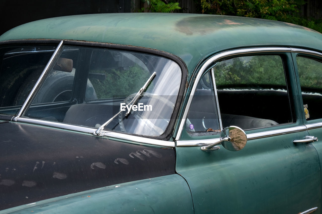 A vintage chevrolet car up close.