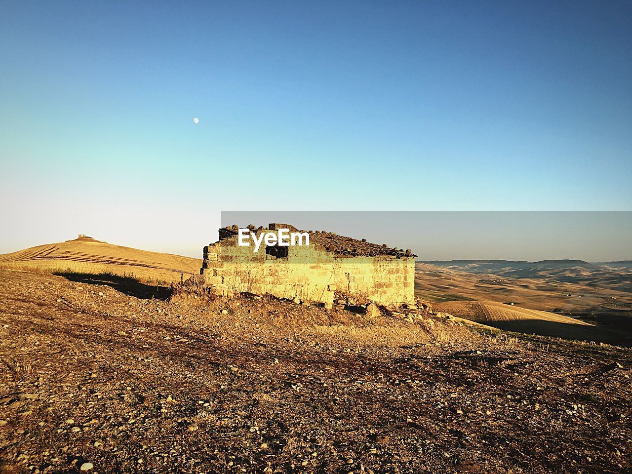 Old ruins against clear blue sky