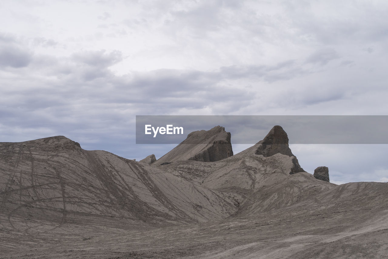 Scenic view of rocky mountains against sky