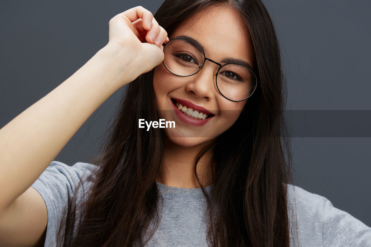 Happy girl wearing eyeglasses