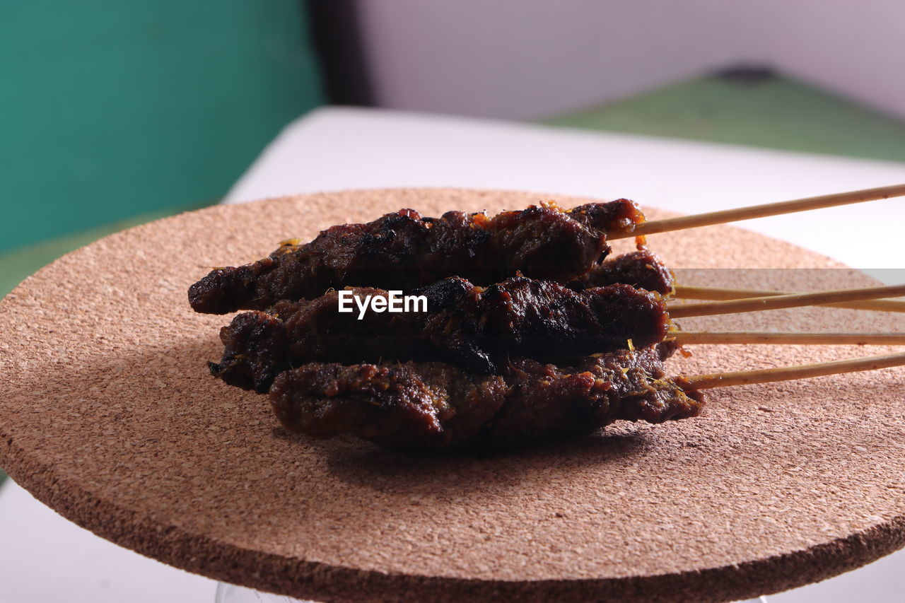 Malaysian satay with delicious peanut sauce, one of famous local dishes