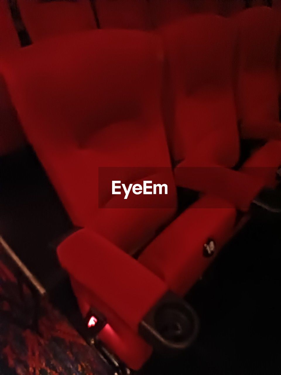 red, arts culture and entertainment, seat, movie theater, indoors, chair, no people, film industry
