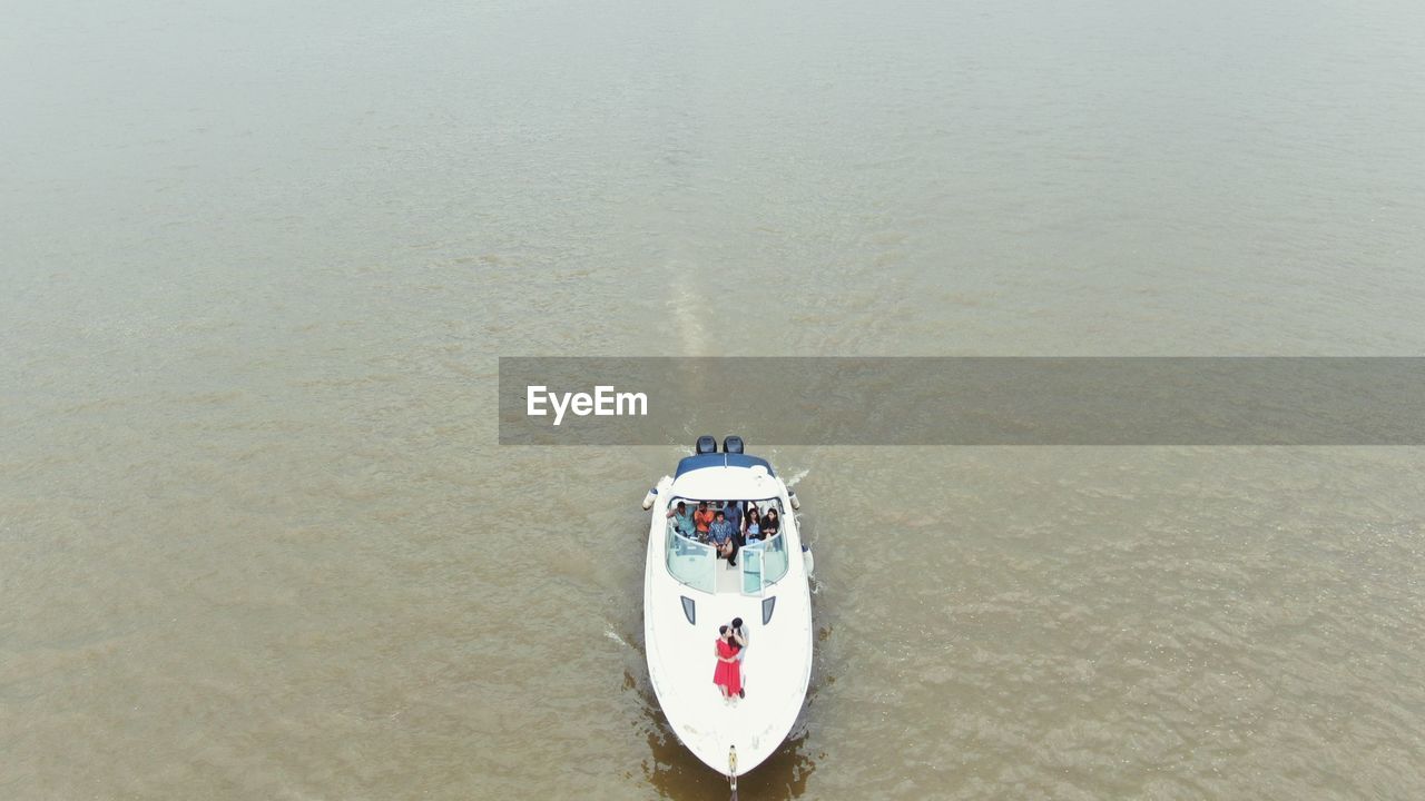 HIGH ANGLE VIEW OF SHIP IN SEA