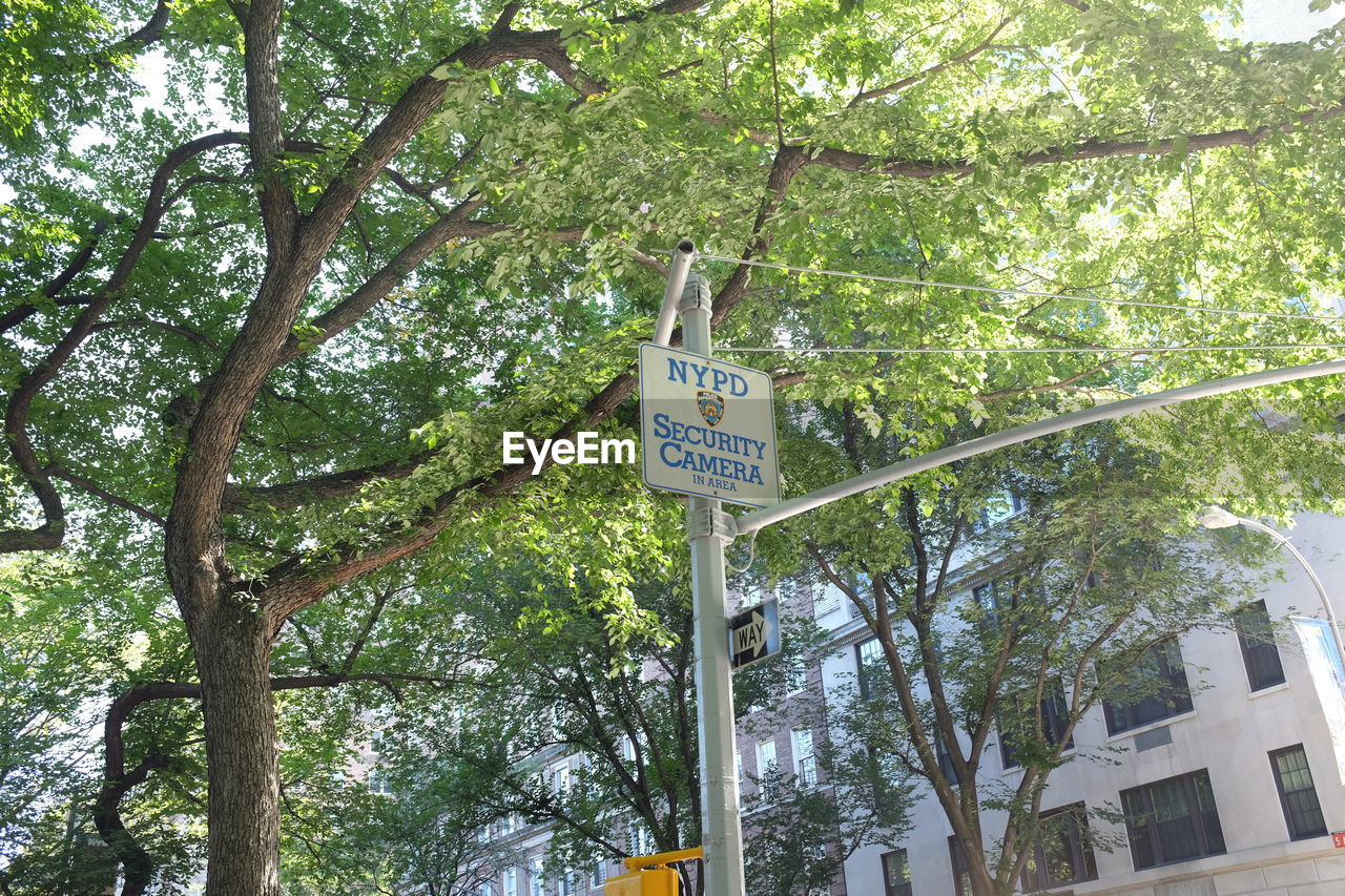 LOW ANGLE VIEW OF INFORMATION SIGN BOARD