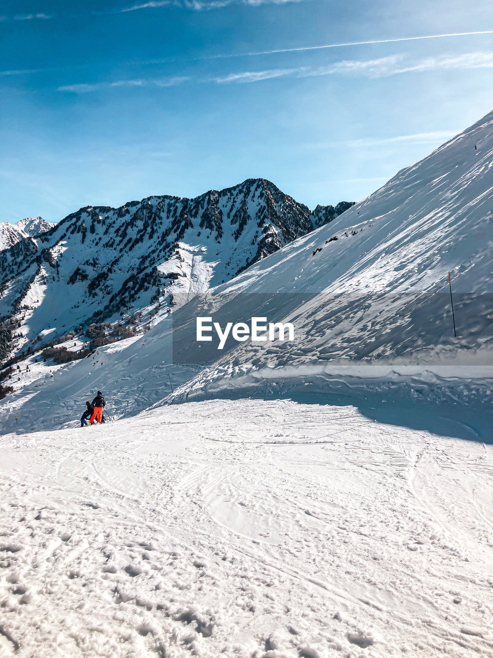 snow, mountain, cold temperature, winter, landscape, environment, mountain range, scenics - nature, sports, adventure, beauty in nature, leisure activity, nature, winter sports, piste, sky, snowcapped mountain, travel, vacation, travel destinations, holiday, trip, skiing, ski touring, one person, activity, ski mountaineering, day, non-urban scene, extreme sports, cloud, land, tourism, outdoors, lifestyles, ski holiday, motion, extreme terrain, frozen, adult, ski equipment, tranquil scene, full length, white, sunlight, ski, exploration, tranquility, hiking, ridge, tourist