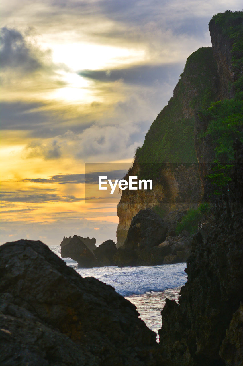 Scenic view of sea against sky during sunset