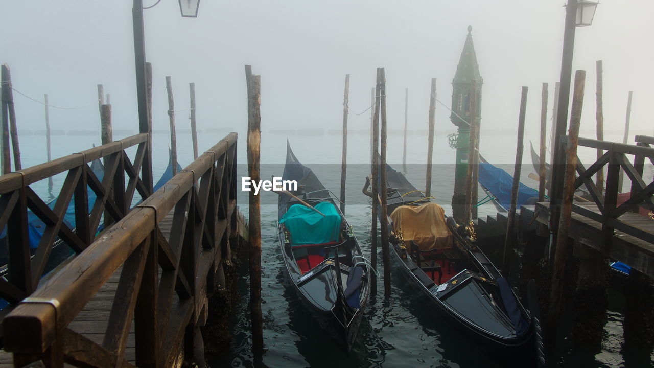 BOATS MOORED IN CANAL