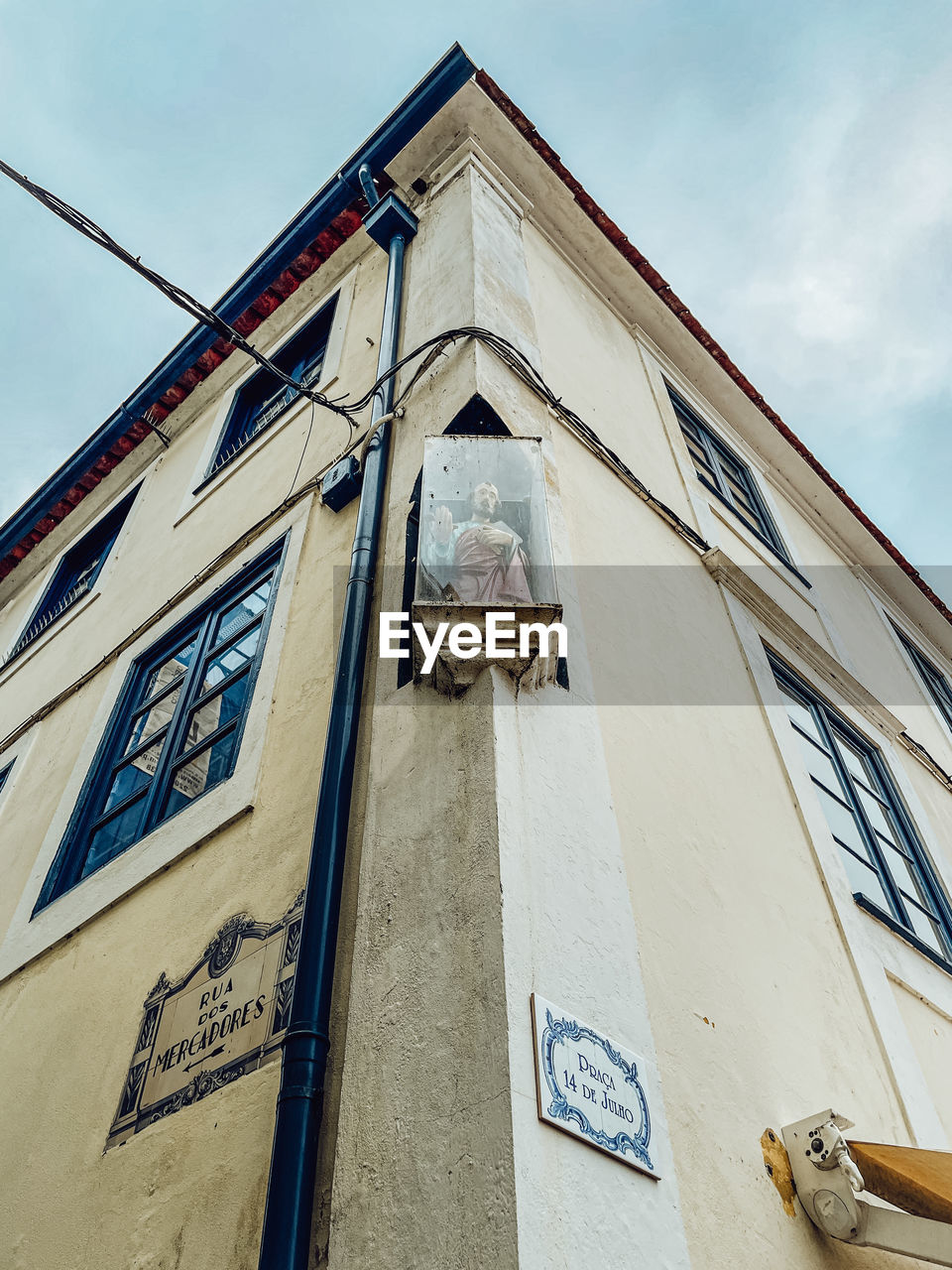 architecture, building exterior, built structure, low angle view, sky, blue, no people, facade, building, nature, day, history, outdoors, window, the past, city, roof, cloud, travel destinations