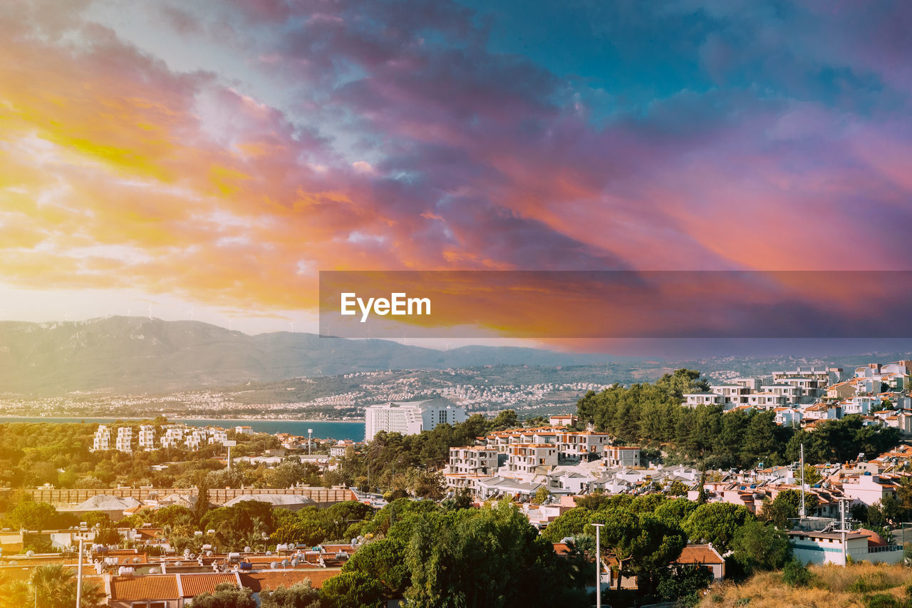 high angle view of cityscape against sky during sunset