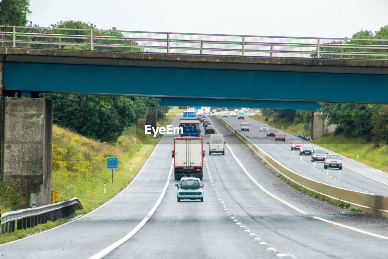 VEHICLES ON ROAD BRIDGE