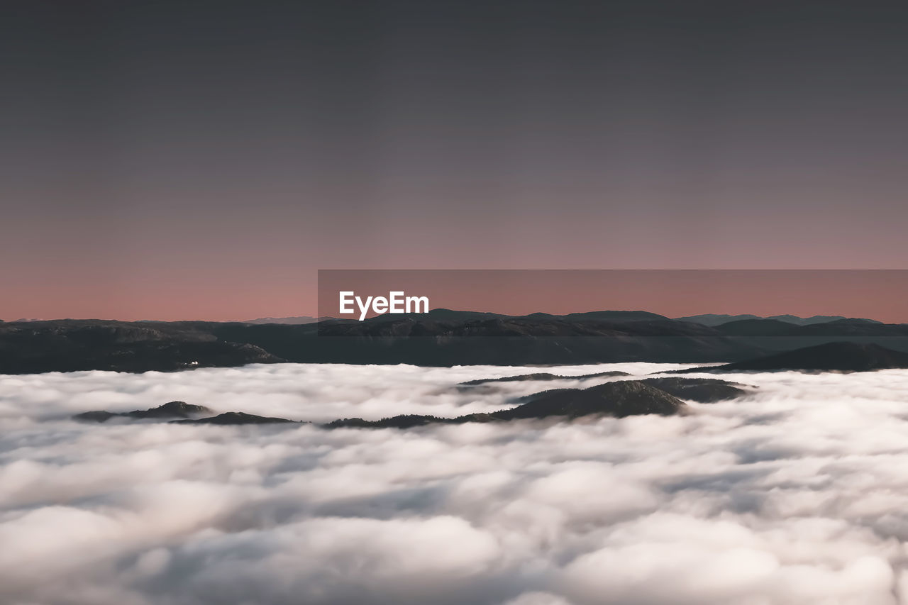 Scenic view of cloudscape against sky during sunset