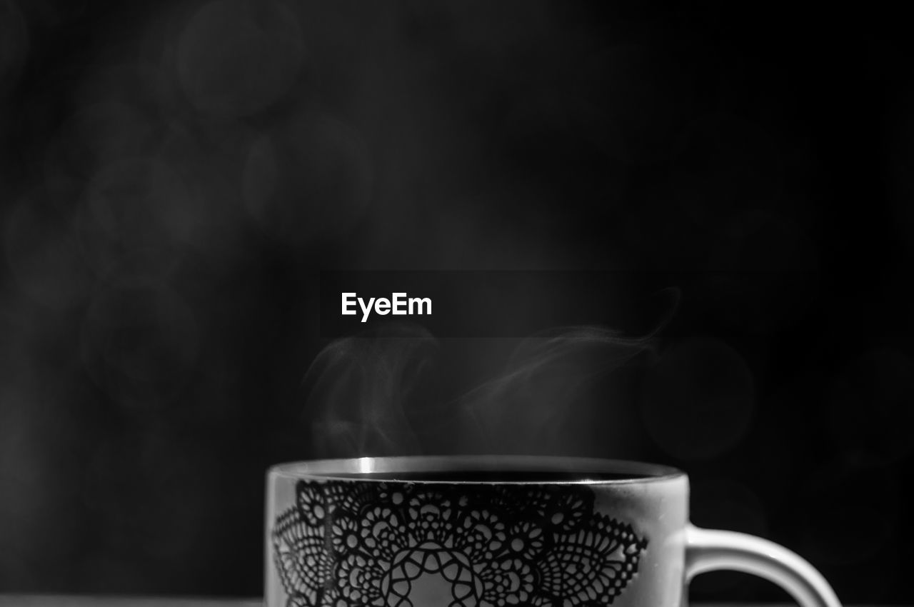 Close-up of coffee cup on table