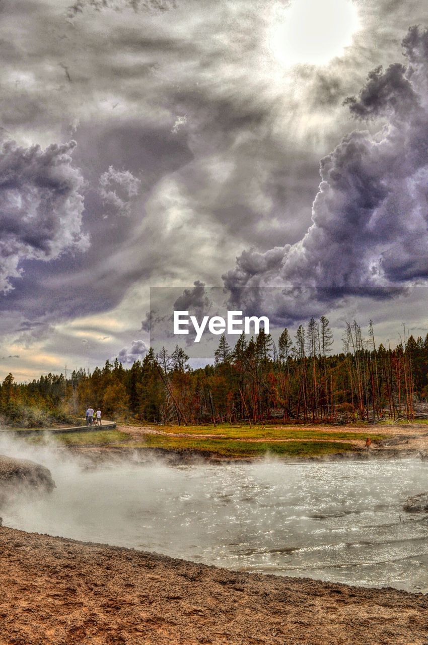 VIEW OF LANDSCAPE AGAINST CLOUDY SKY