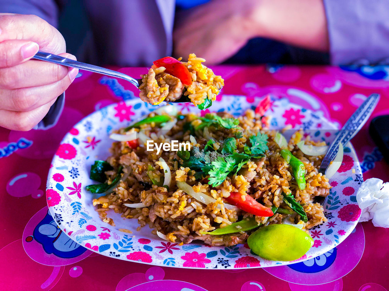 Midsection of woman holding food