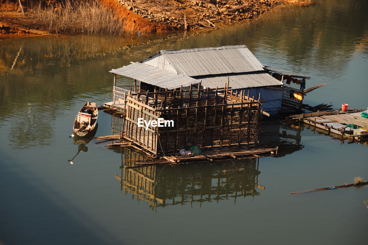 Floating fish farm in a lake outside da nang, vietnam