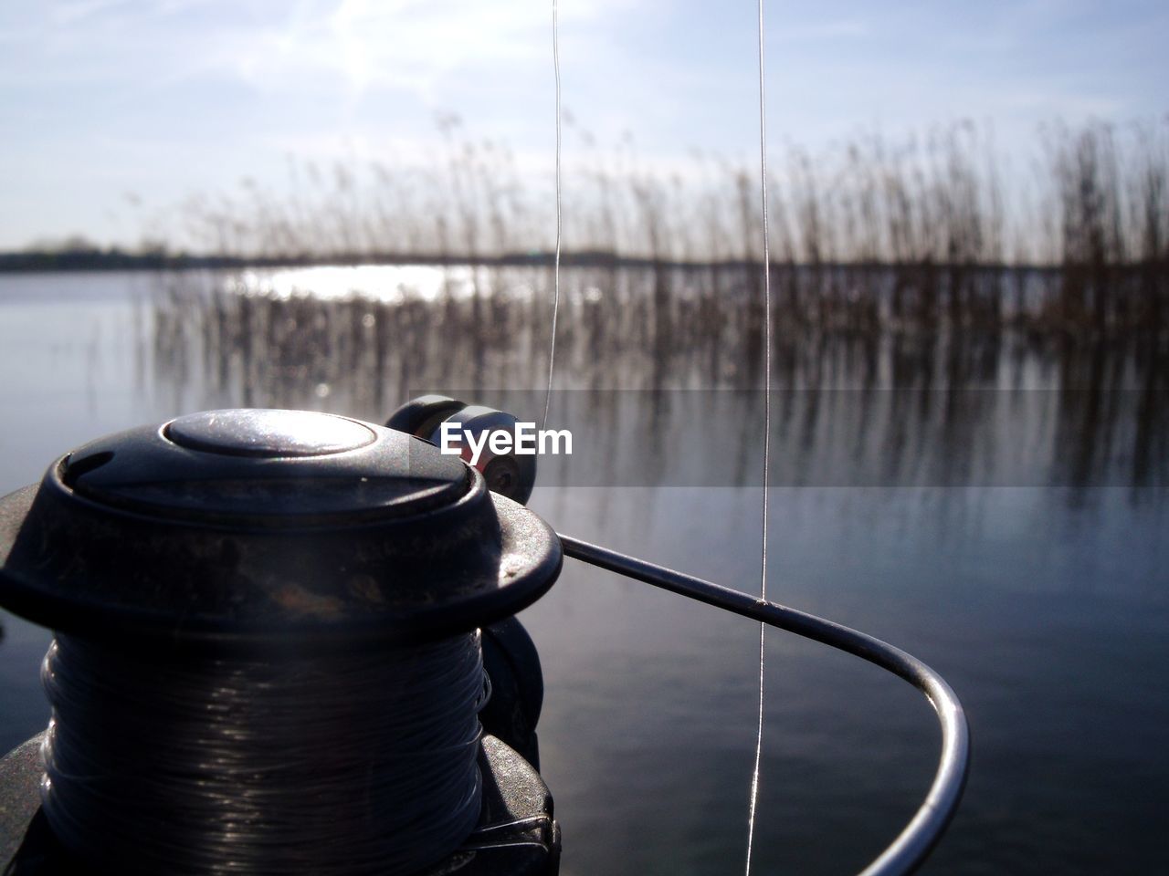 CLOSE-UP OF ROPES IN LAKE