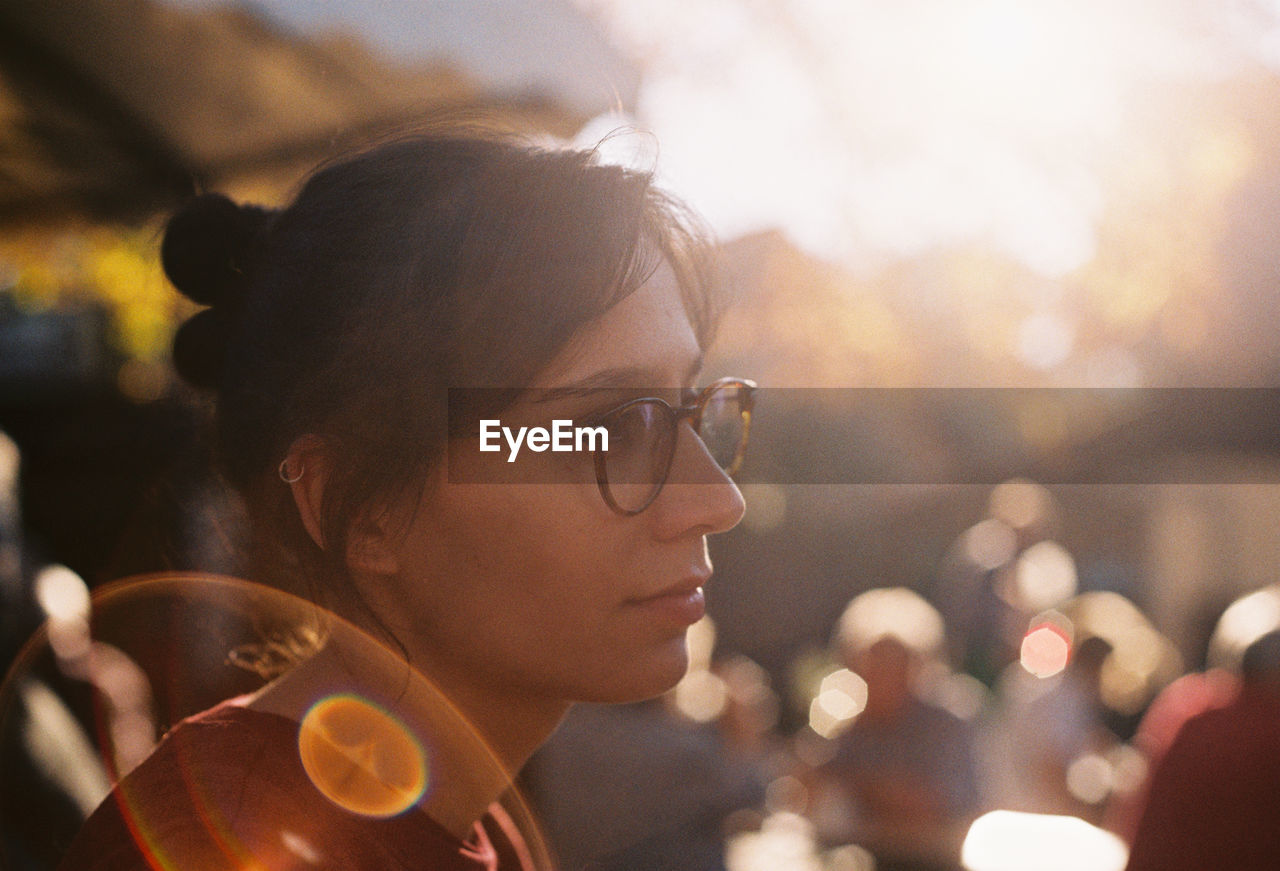 Close-up of thoughtful woman outdoors