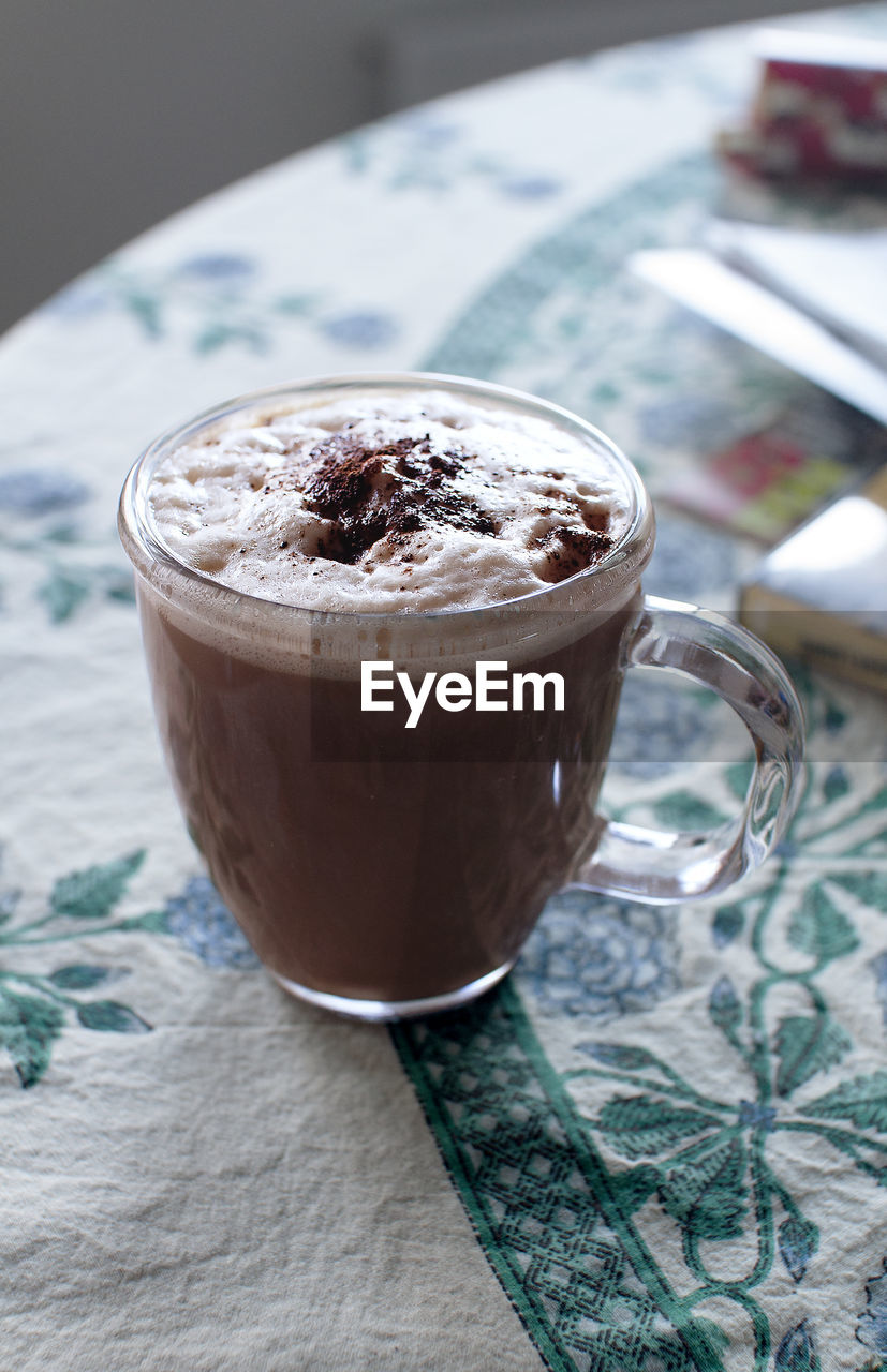 Close-up of cappuccino on table