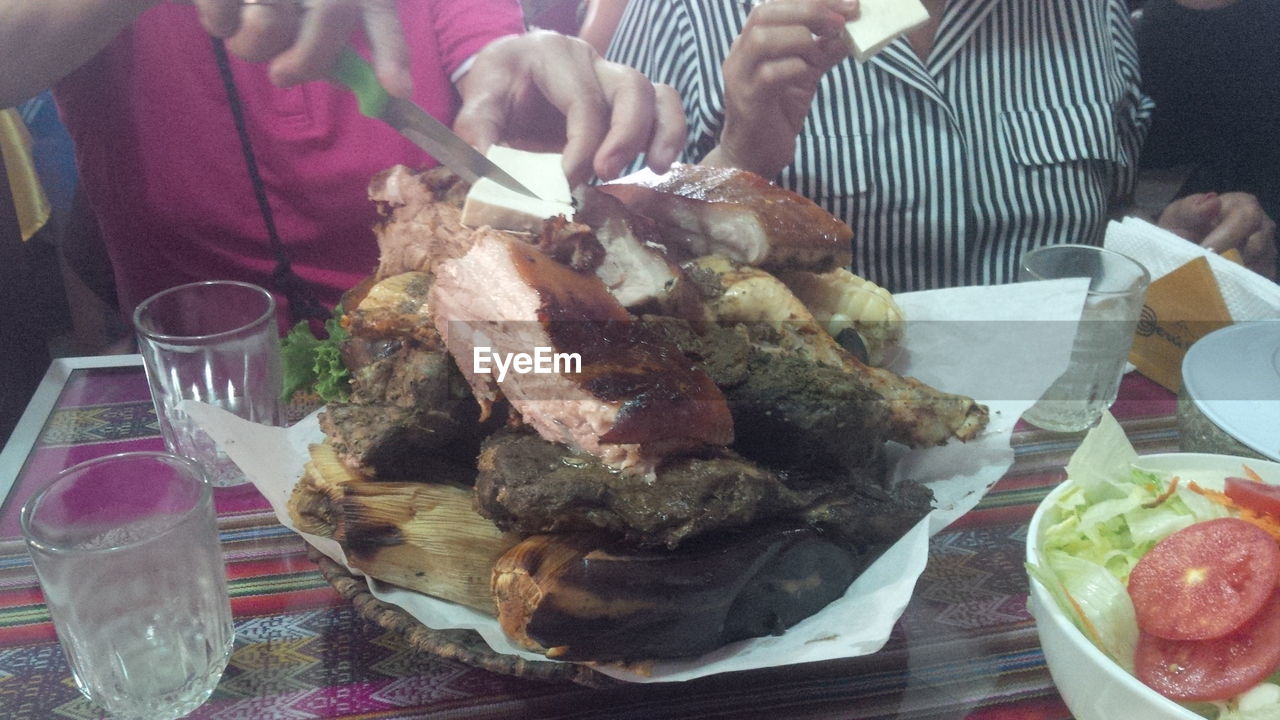 CLOSE-UP OF FOOD SERVED ON TABLE