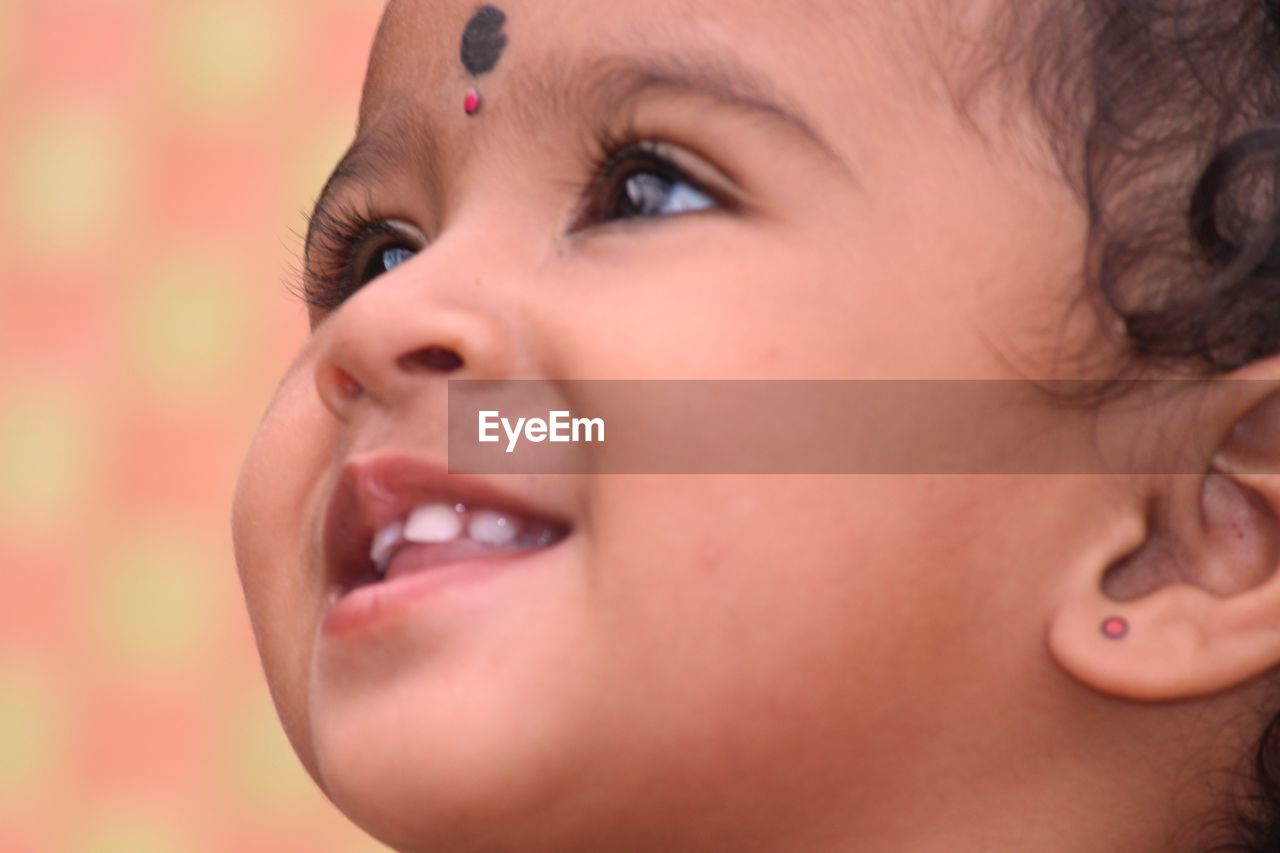 Close-up of smiling toddler