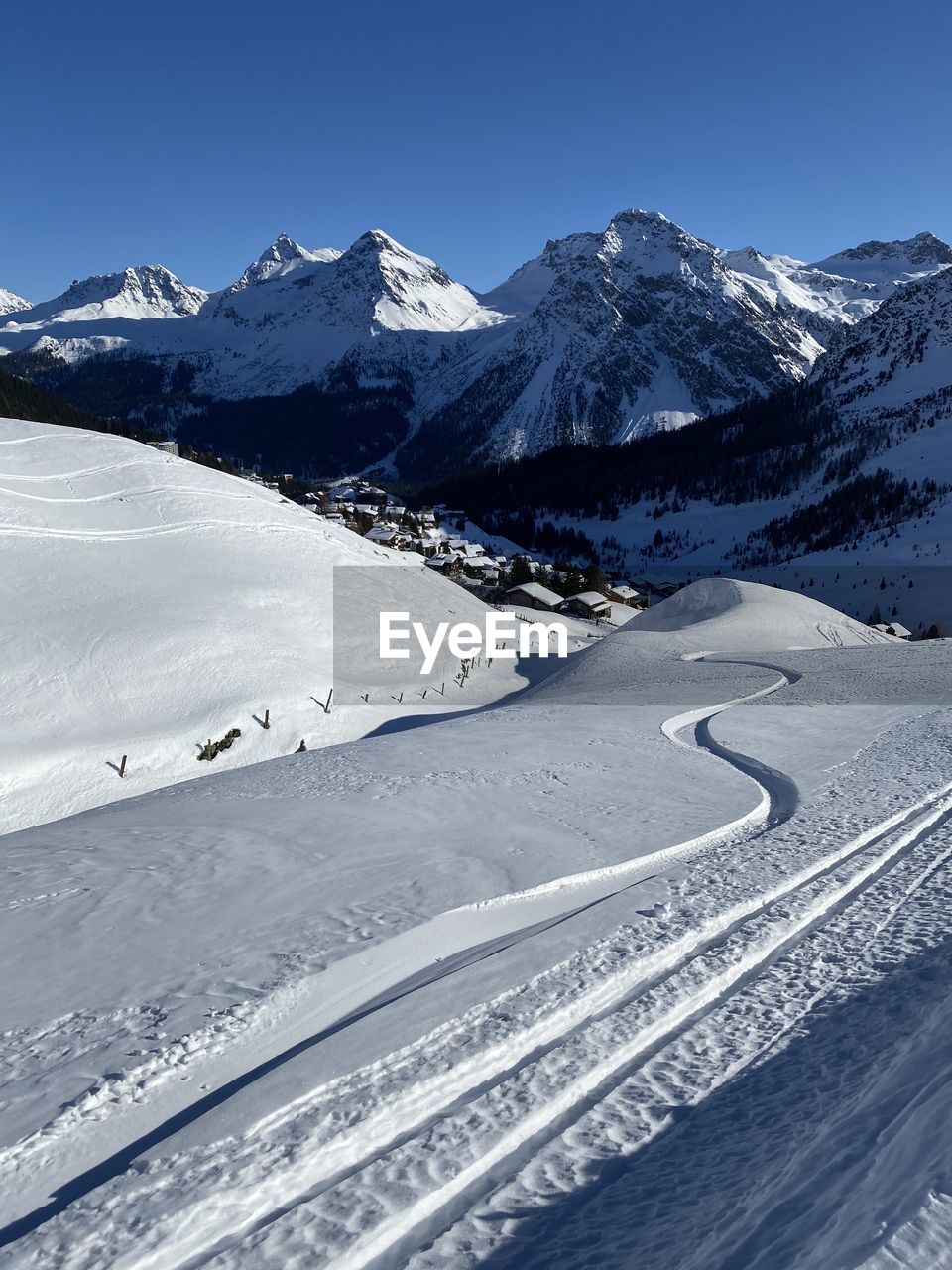 SNOWCAPPED MOUNTAINS AGAINST CLEAR SKY