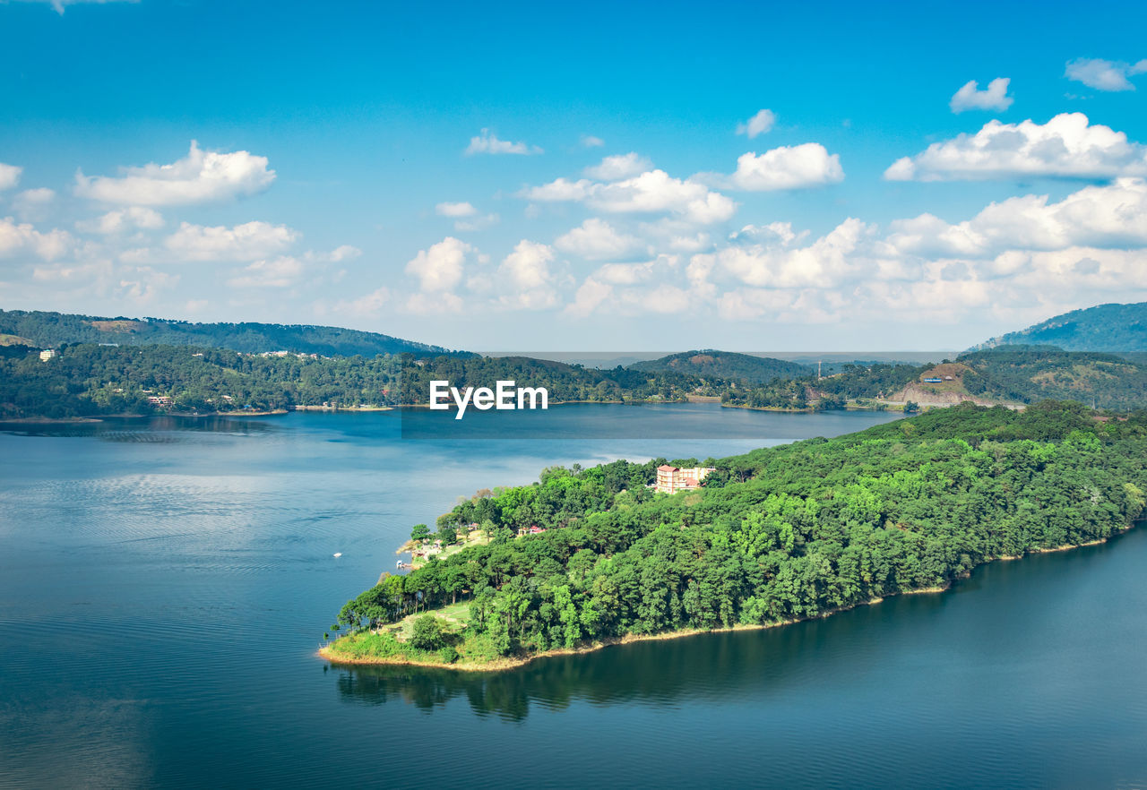 Serene lake with mountain background at day from top angle