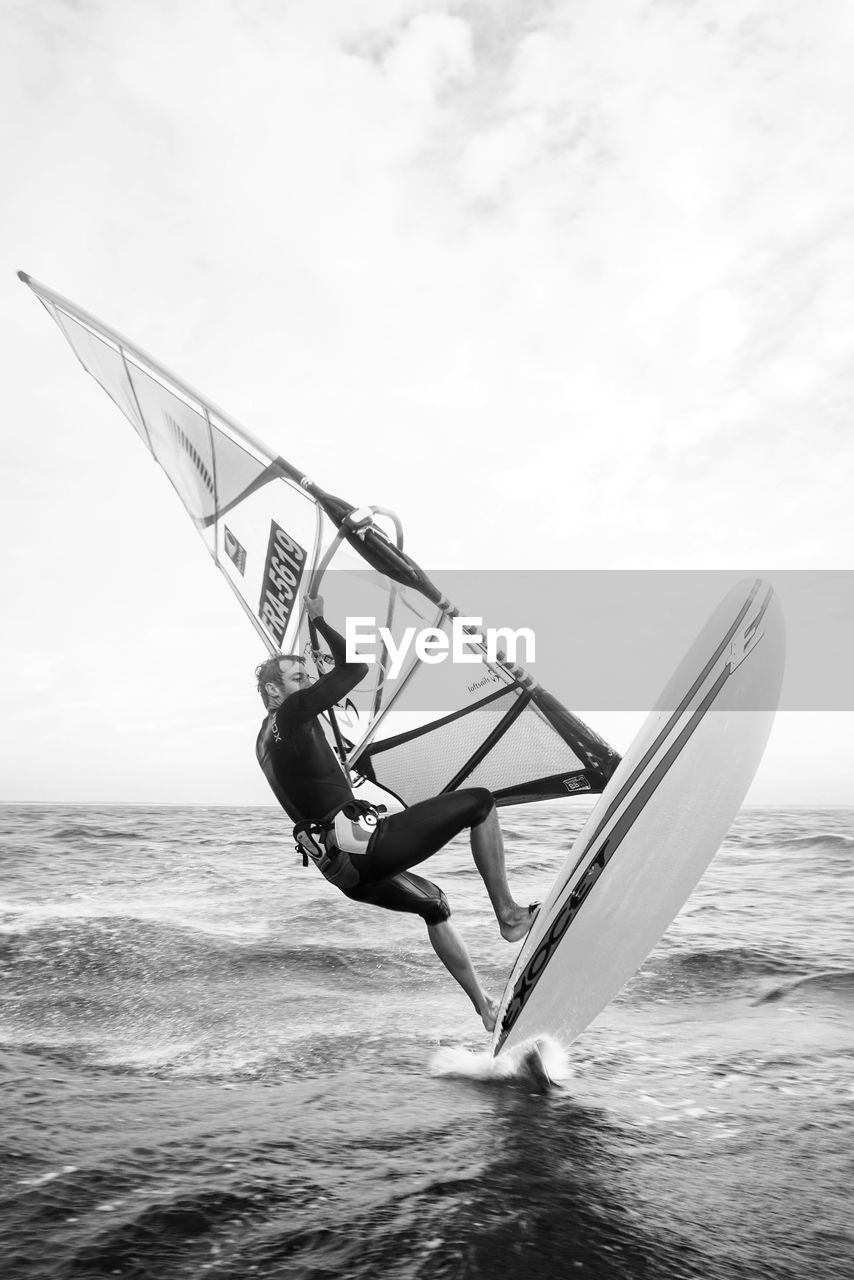 LOW ANGLE VIEW OF BOAT AGAINST SKY