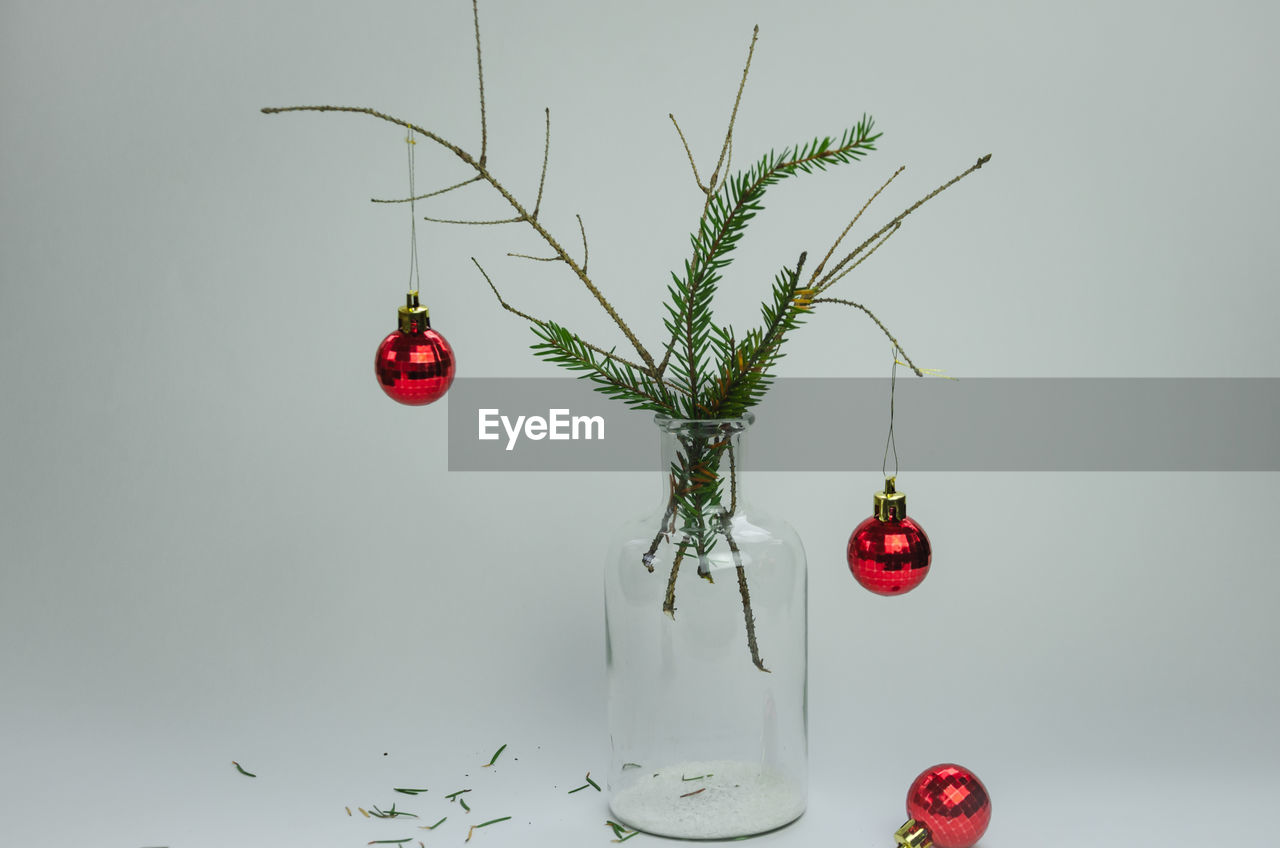 close-up of christmas decorations against white background