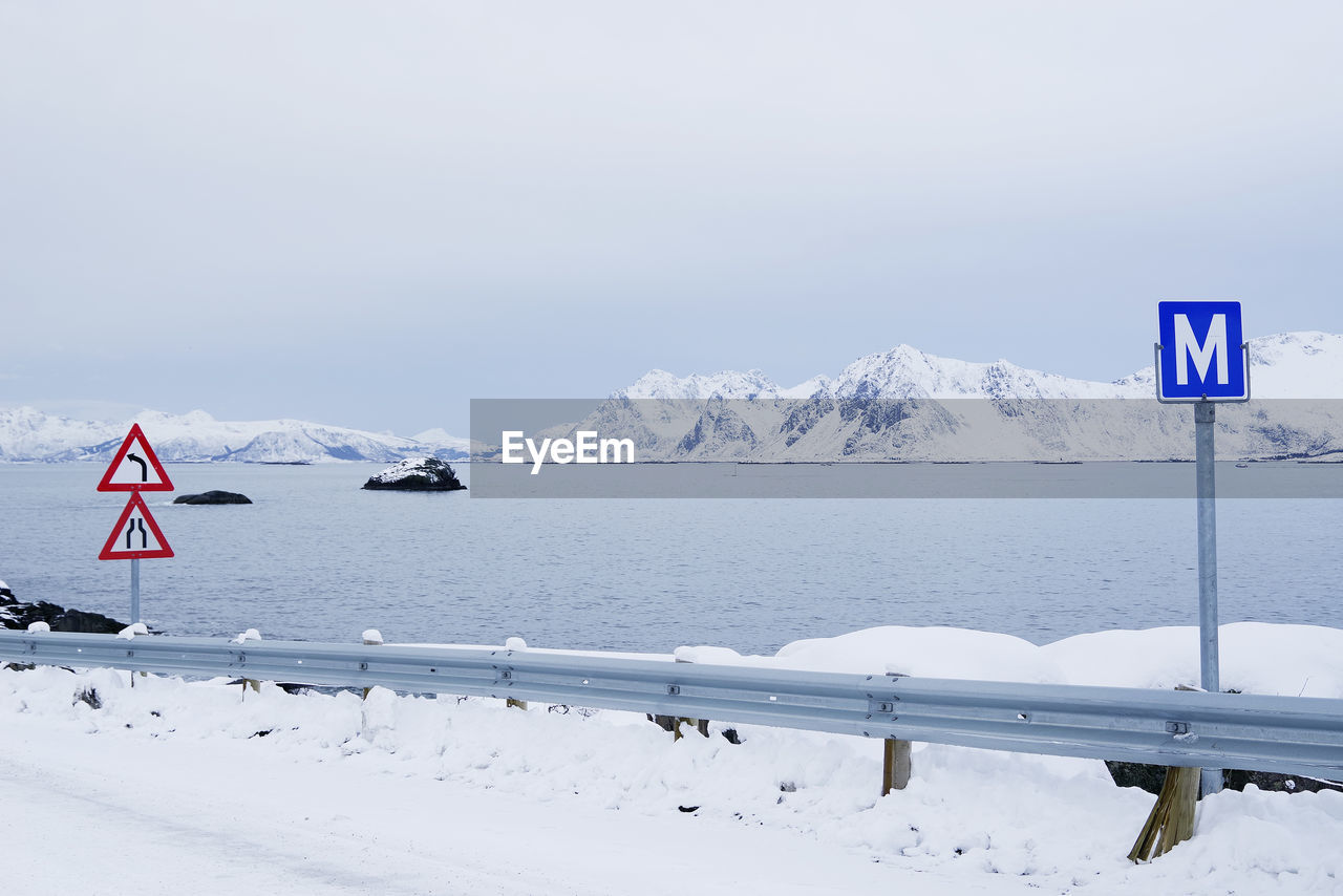 Scenic view of snow covered mountain against sky