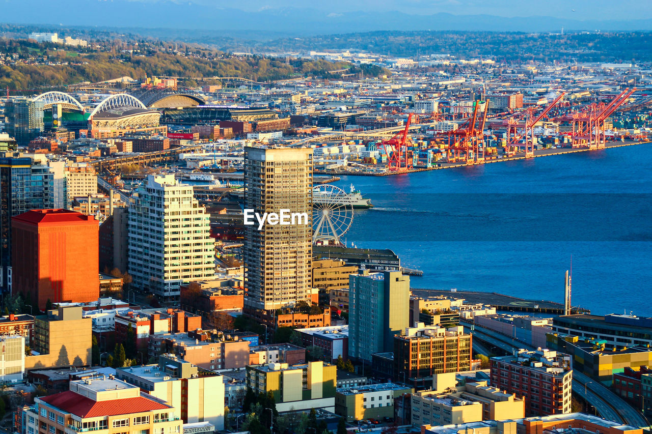 High angle view of river by cityscape