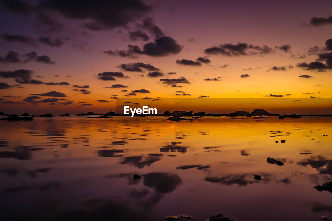 Scenic view of sea against sky during sunset