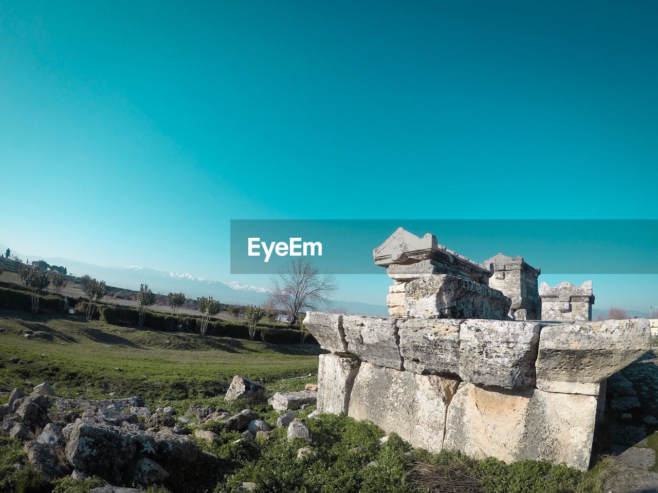 Old ruins against clear blue sky