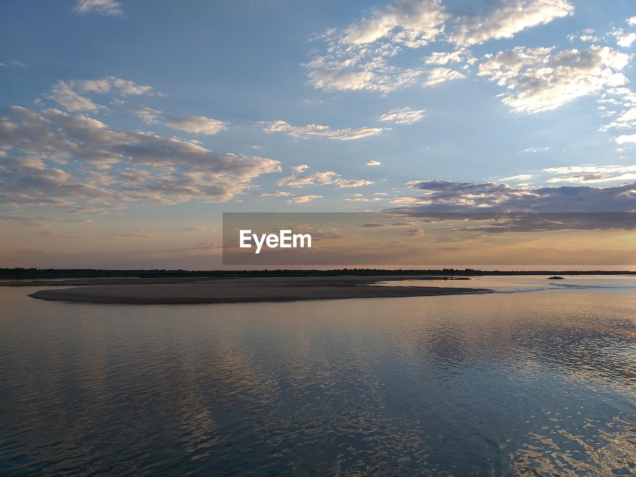 SCENIC VIEW OF SEA DURING SUNSET