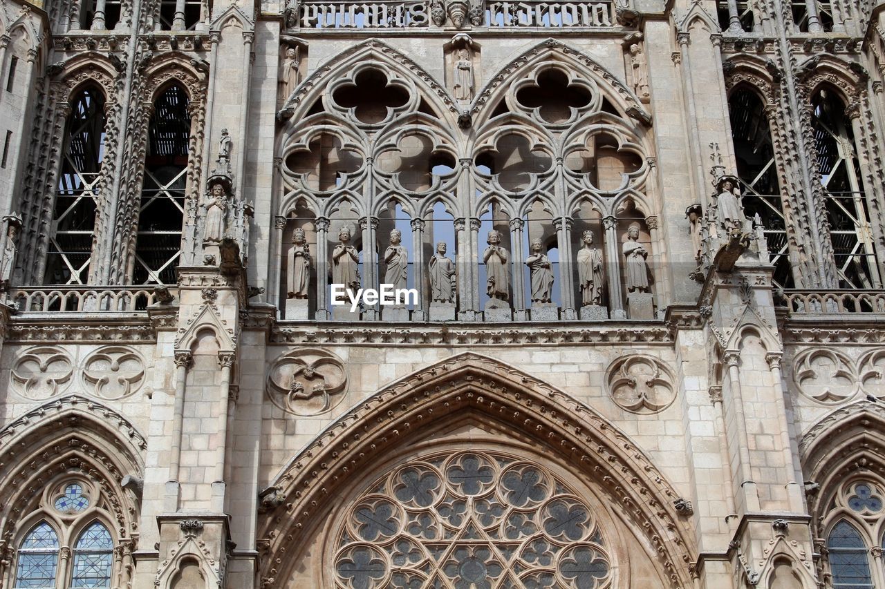 LOW ANGLE VIEW OF ORNATE CATHEDRAL