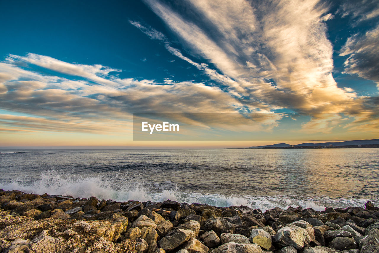 Scenic view of sea against sky during sunset