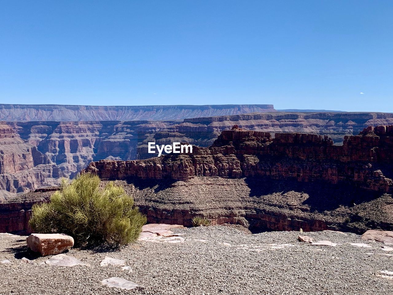 Panoramic view of rock formations against clear sky