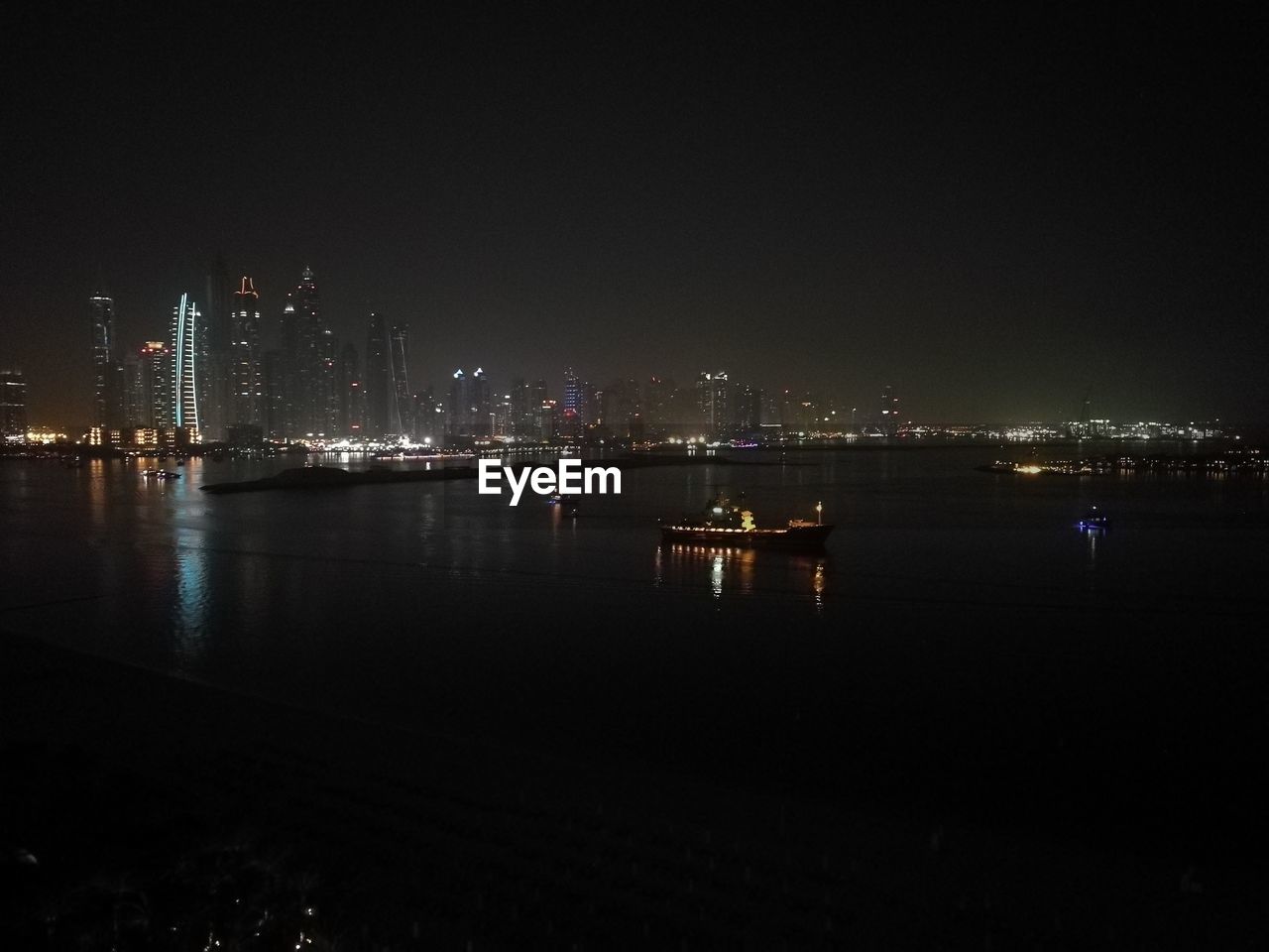 ILLUMINATED CITY AT NIGHT