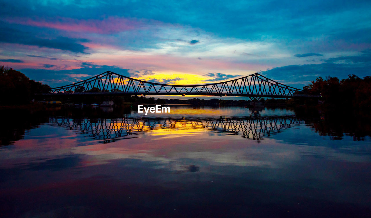 VIEW OF BRIDGE OVER RIVER AGAINST SKY