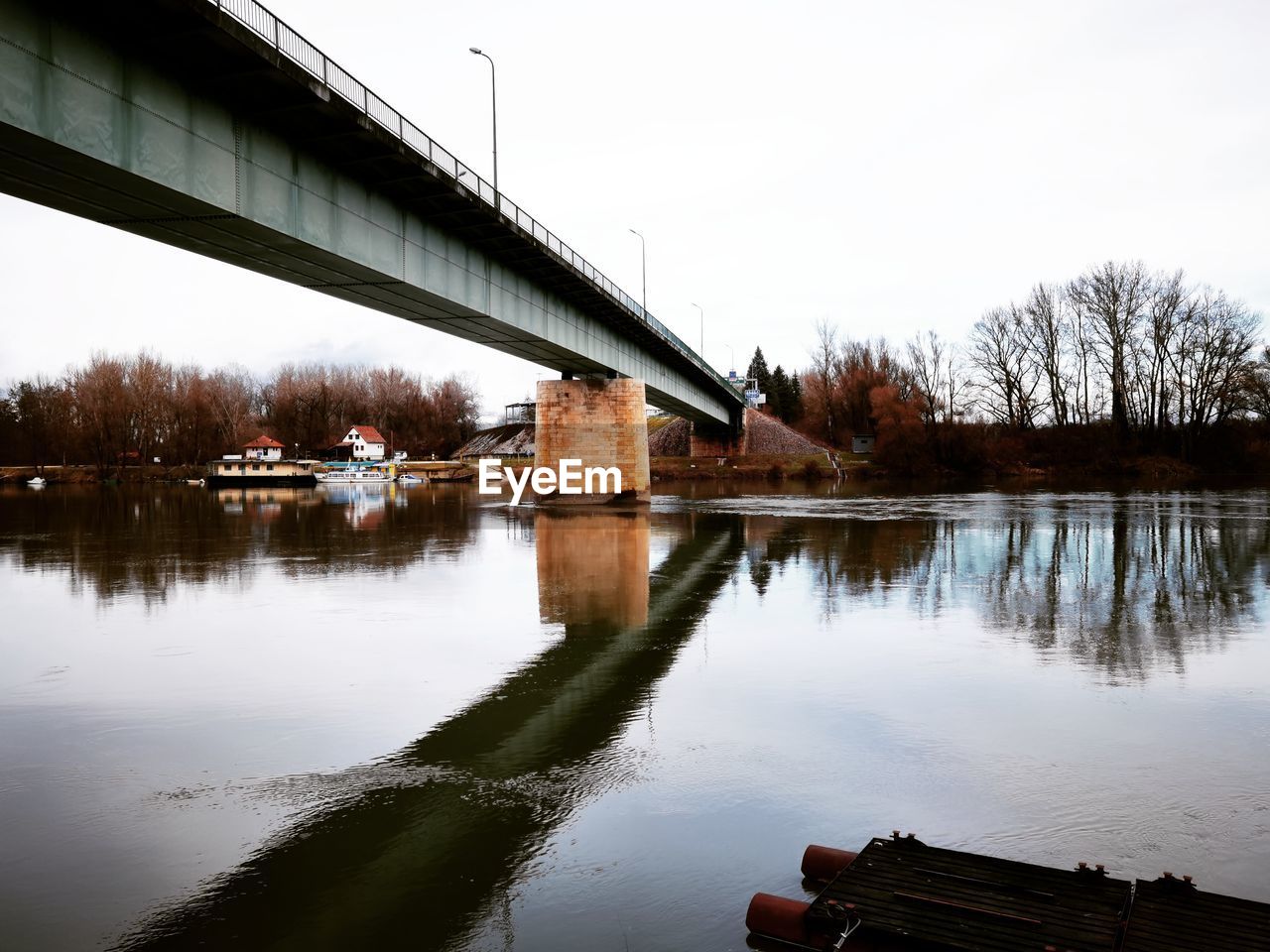 VIEW OF BRIDGE OVER RIVER AGAINST SKY