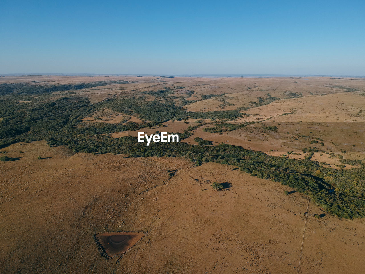 SCENIC VIEW OF LAND AGAINST CLEAR SKY