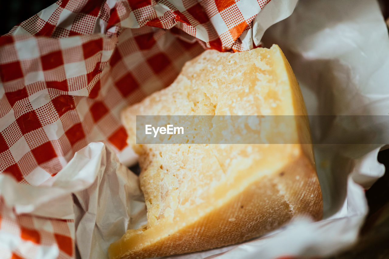 Close-up of cheese on paper