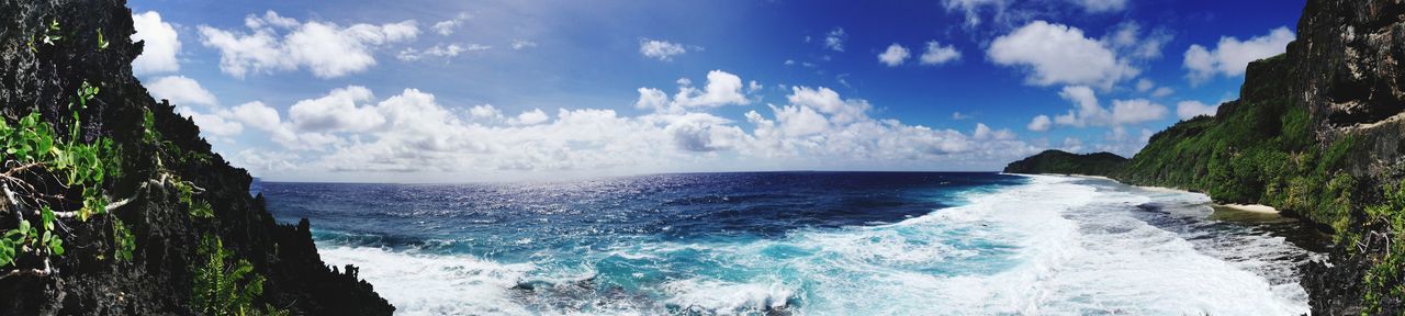 PANORAMIC SHOT OF SEA AGAINST BLUE SKY