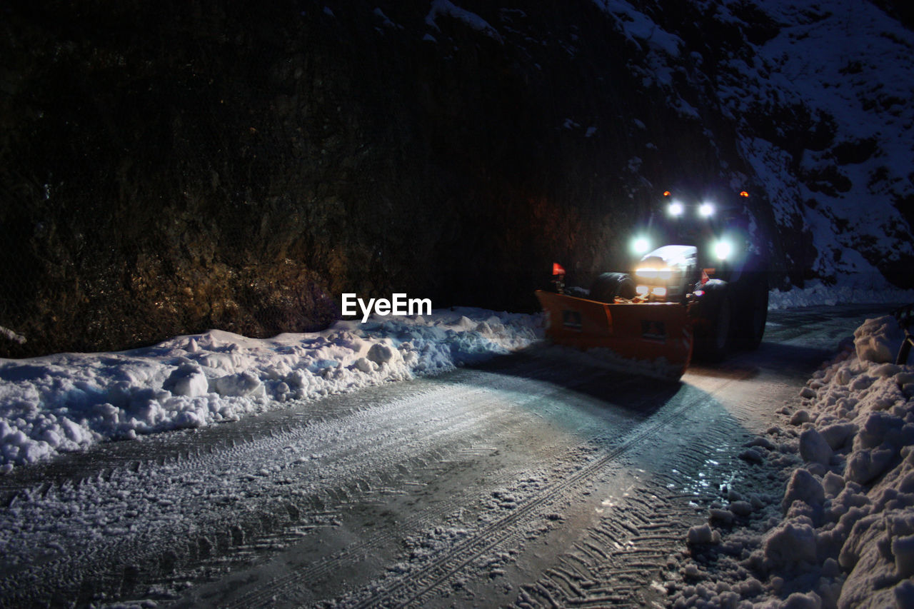 ILLUMINATED SNOW COVERED LAND DURING WINTER