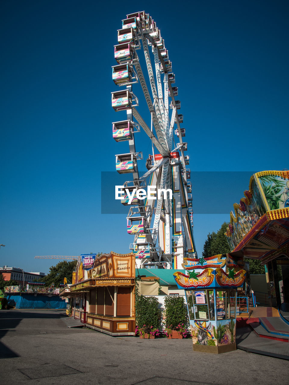 LOW ANGLE VIEW OF FERRIS WHEEL AGAINST SKY