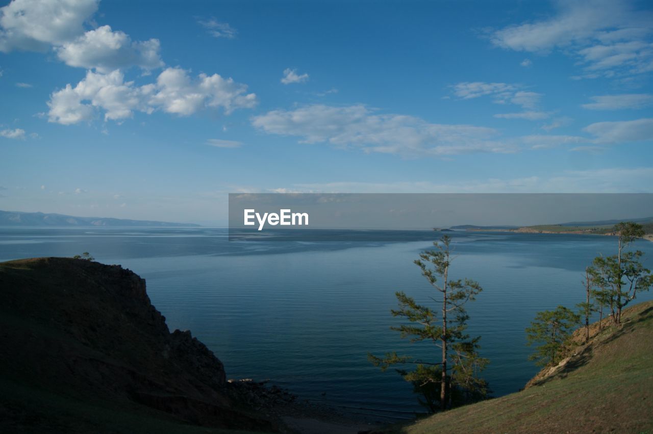 Scenic view of beach and sea against sky