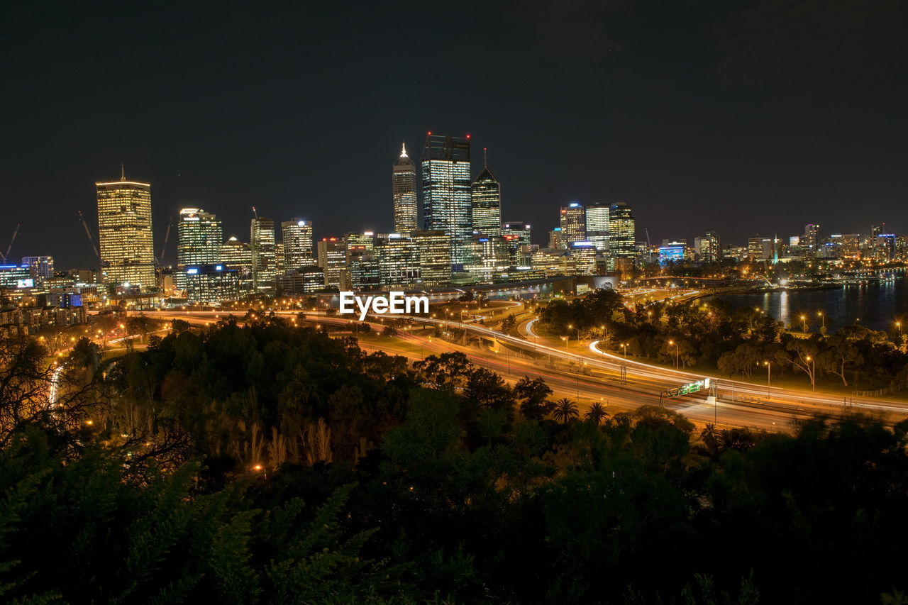 High angle view of illuminated cityscape at night