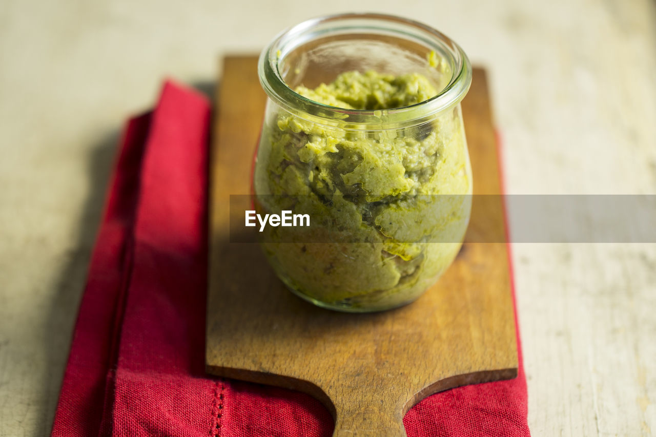 CLOSE-UP OF DRINK IN JAR